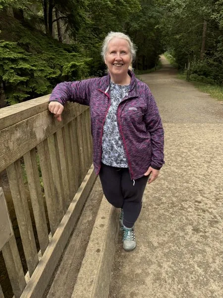 Ethna on a walk along a forest path